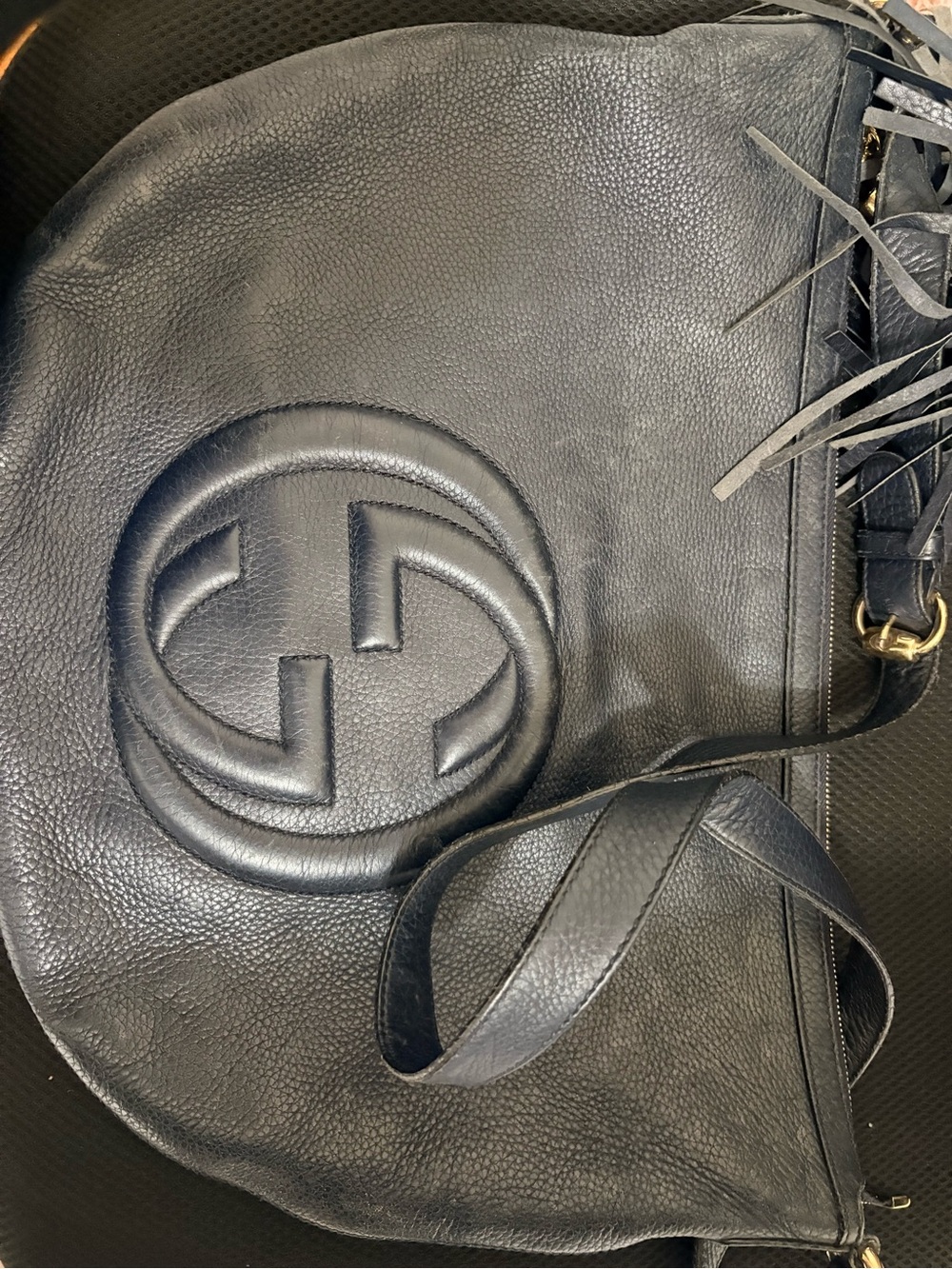 Gucci Black Pebbled Leather Hobo Bag with Embossed Logo